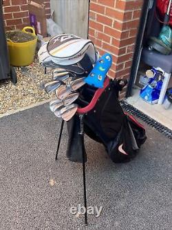 Full set of golf clubs, Titleist irons, Scotty Cameron putter, cobra driver