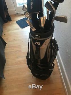 Full set of mizuno irons, taylormade woods, scotty cameron putter and bag